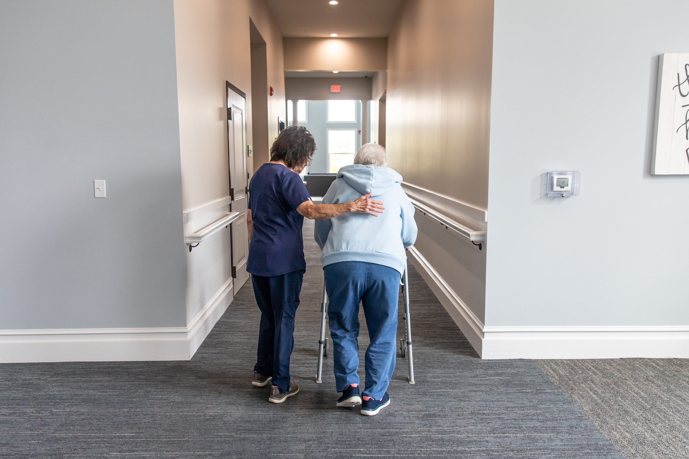 Naturally lit corridor inside a senior living community owned by WRG